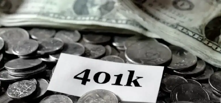 401k retirement savings concept showing coins and cash representing long term retirement investing