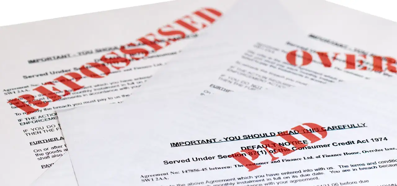 overdue bills and financial notices representing living paycheck to paycheck